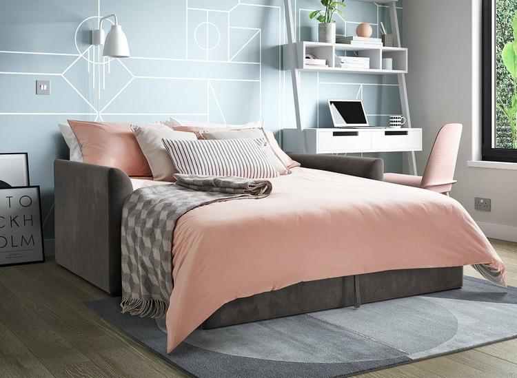 Hazel velvet grey sofa bed with pink duvet