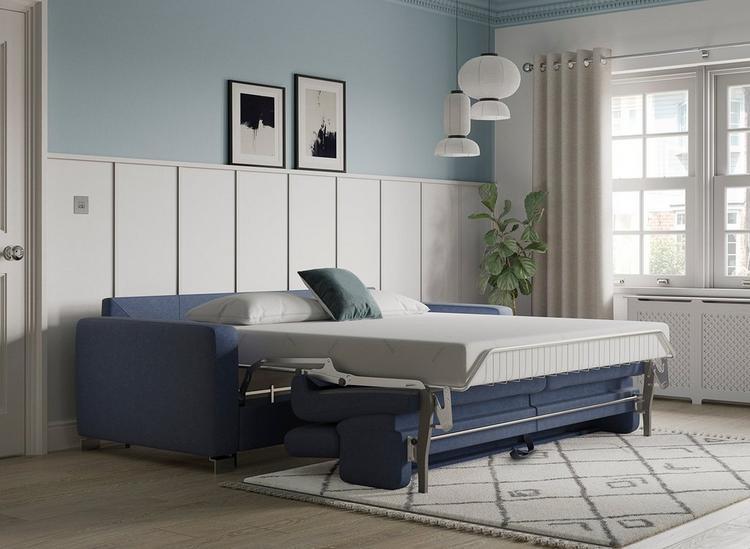 TEMPUR Altamura sofa bed in blue, set up for sleep, revealing a plush 15cm TEMPUR mattress.