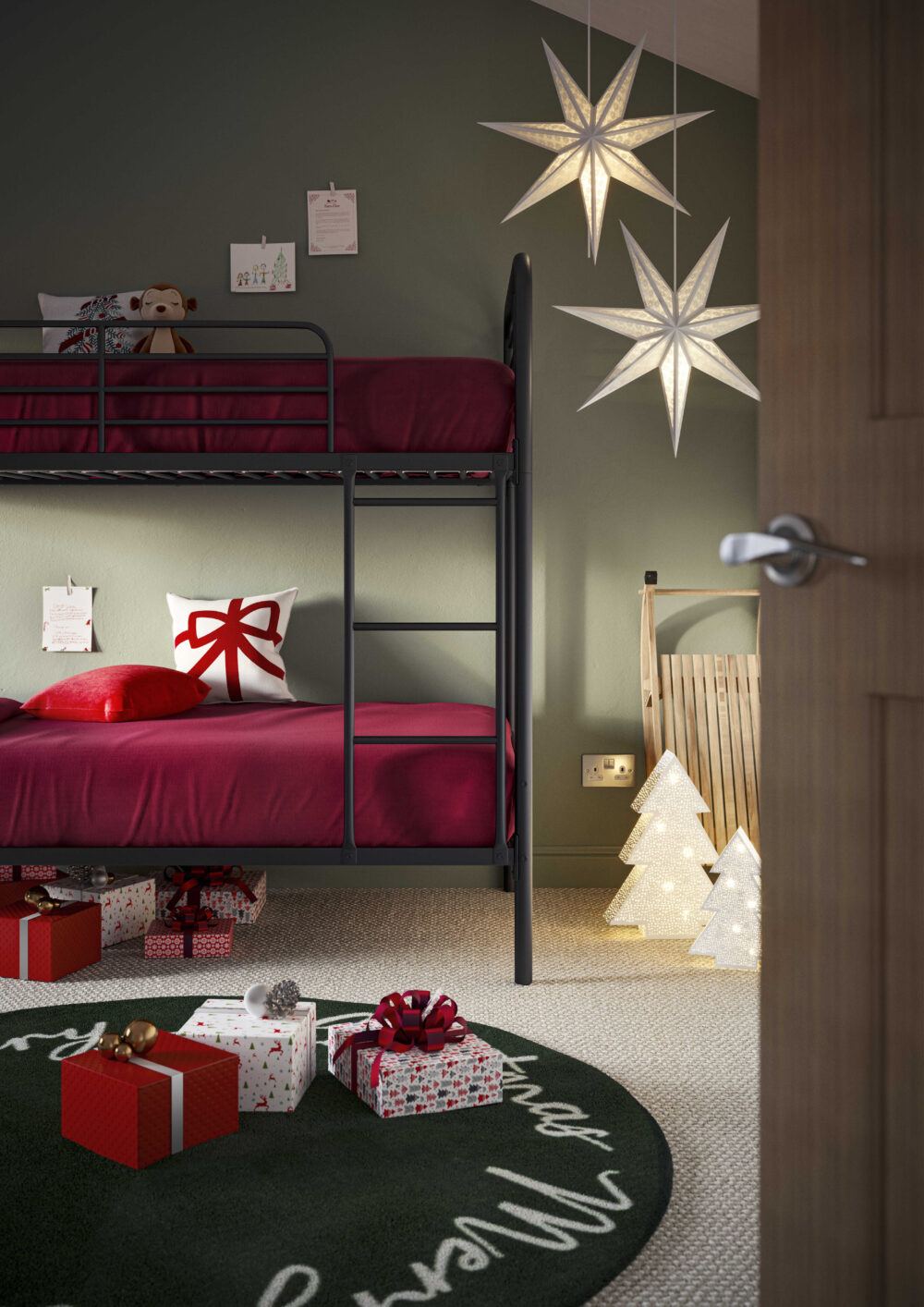 A festive green and red children's bedroom, with a black metal bunk bed