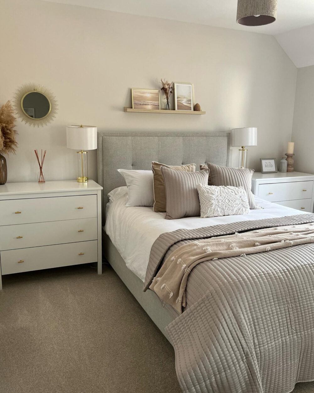 Natural tone bed frame, styled in a neutral beige room with silver accents