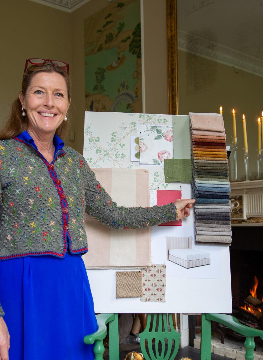 Sophie Conran with a moodboard of fabric and colour swatches
