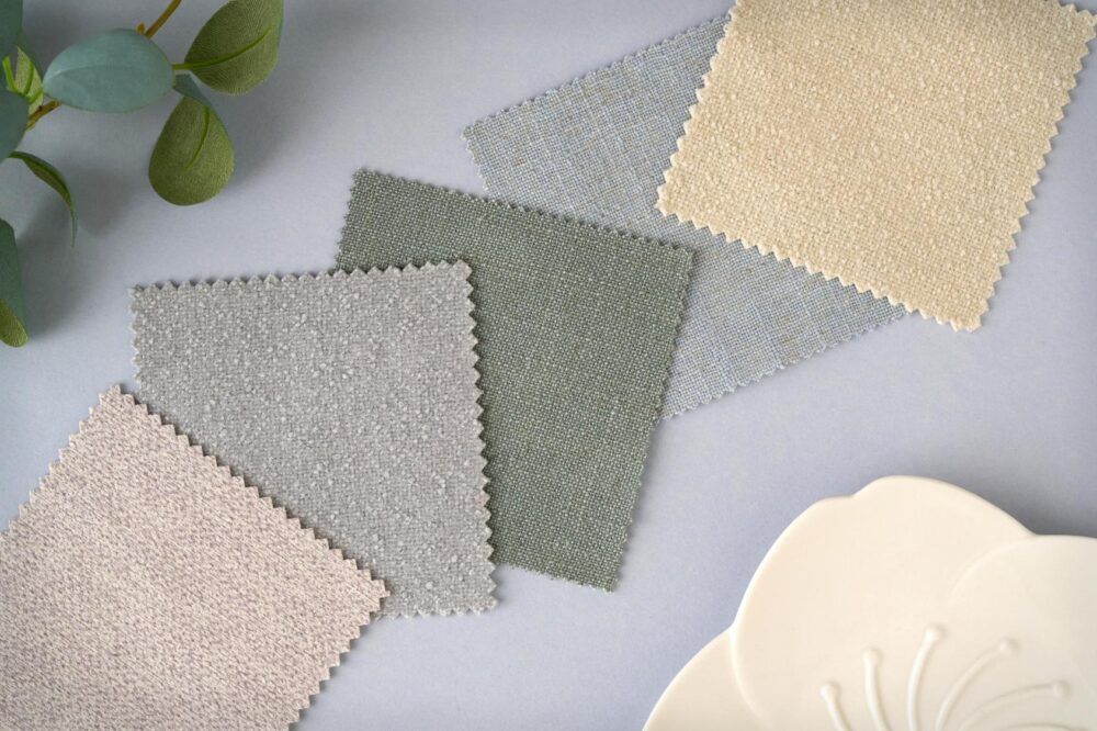 Moodboard of pale fabric swatches