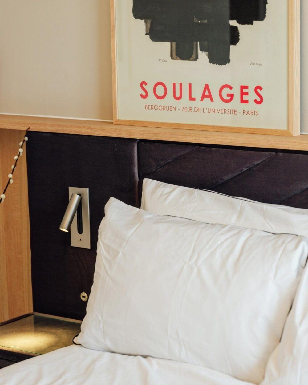 Navy velvet-touch hotel style bed, with built-in lighting