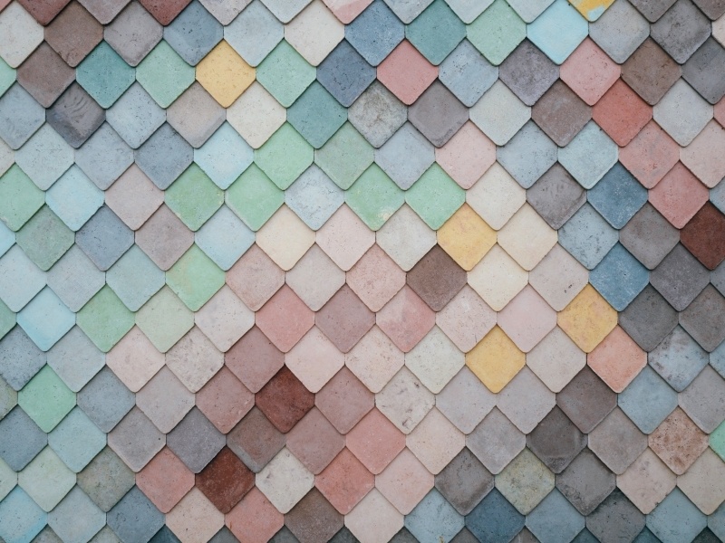 image of grey diamond tiles surrounded by other pastels and bright colours