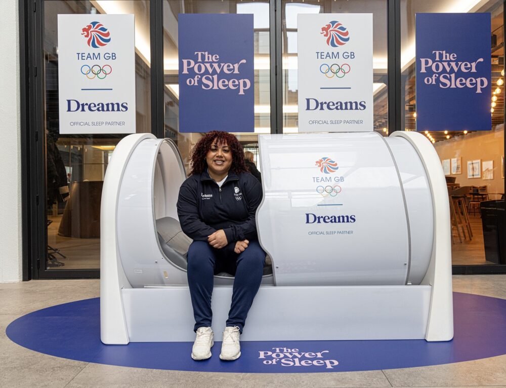 Olympian Emily Campbell, pictured with a Dreams Paris 2024 Sleep Pod