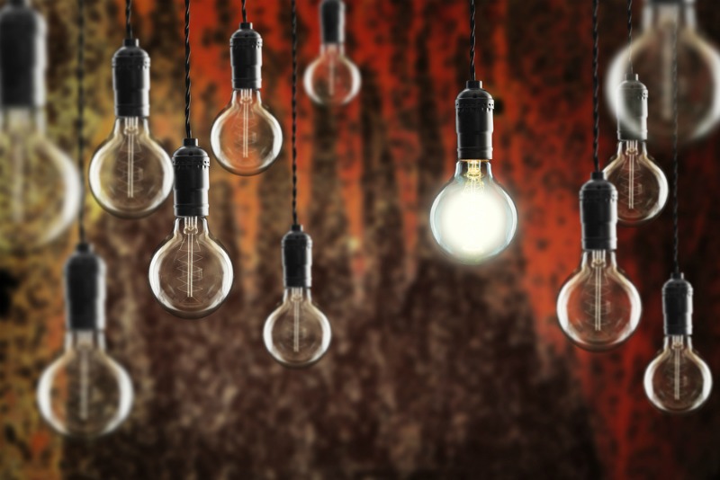 An image of several hanging lightbulbs