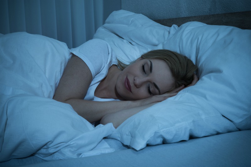 An image of a woman asleep