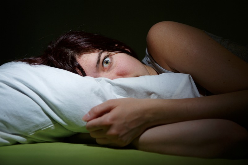 Image of a woman having a nightmare