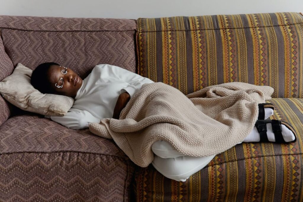 Your Guide To Sleeping On The Sofa - The Sleep Matters Club