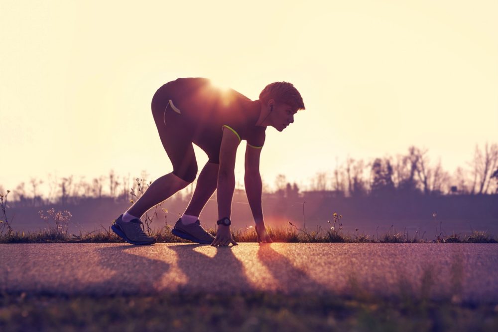 athlete getting ready to run