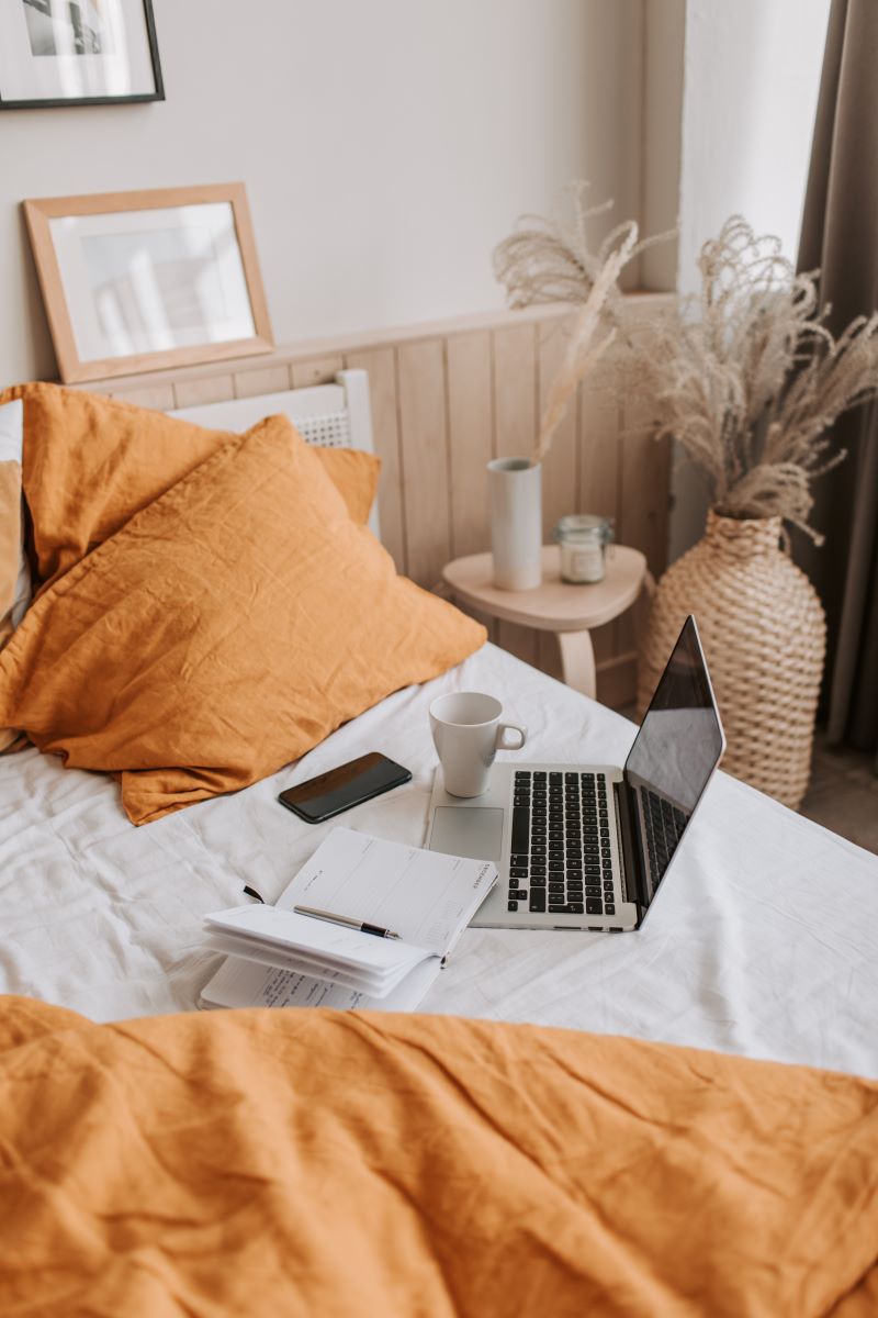 image of bed with lightweight cotton bed sheets