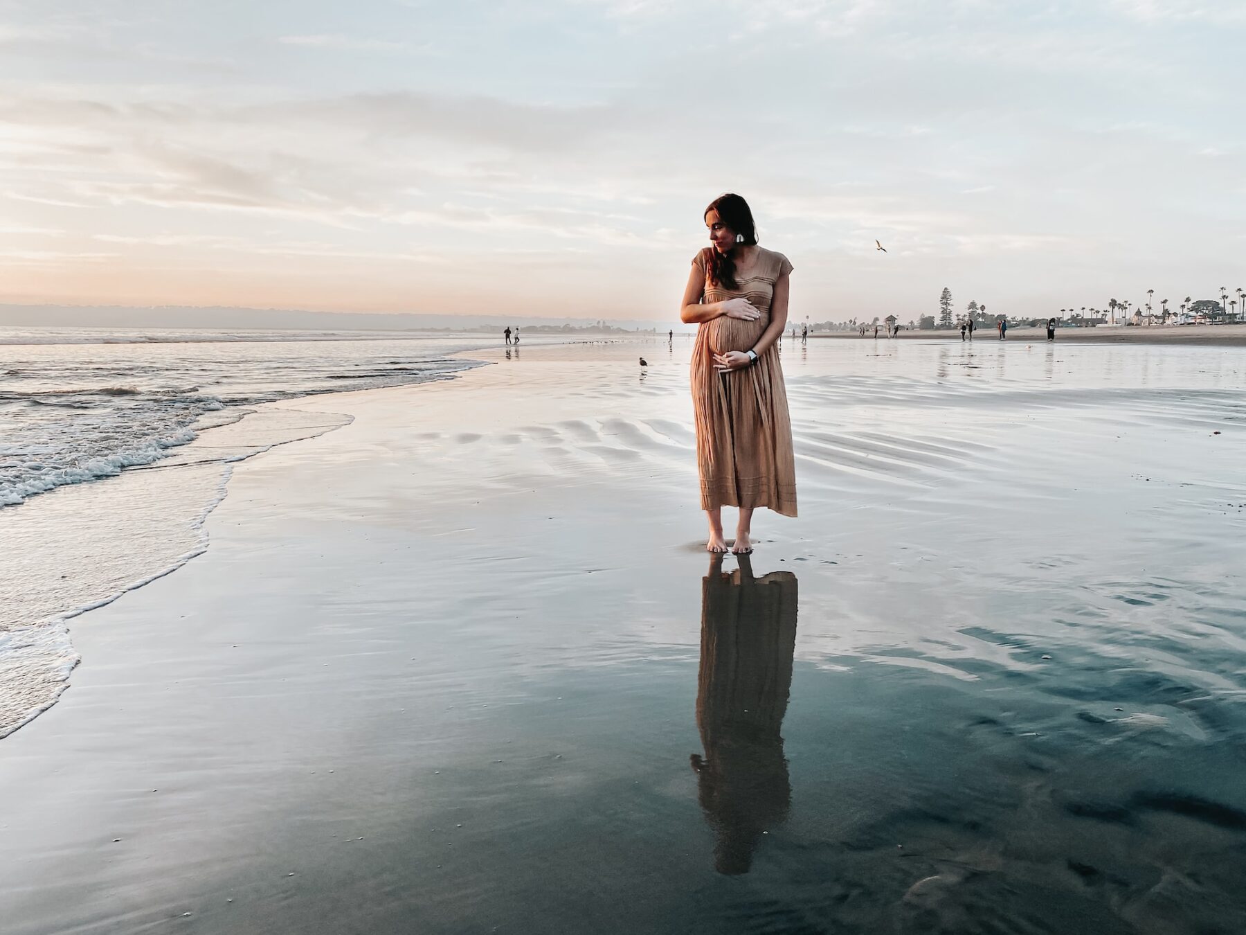 Pregnant women on beach