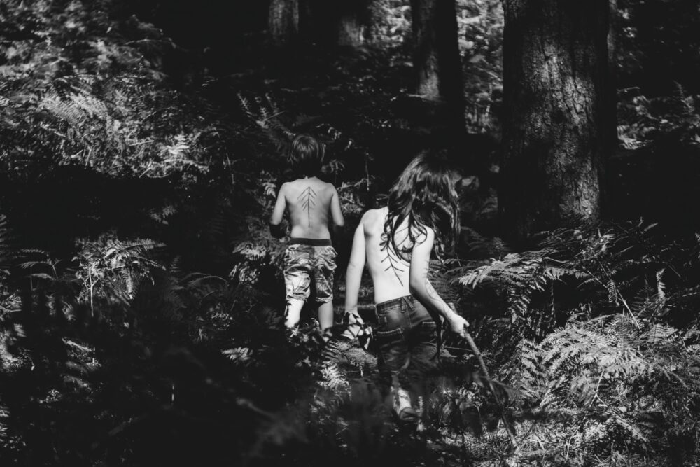 two naked women in a dreamy landscape