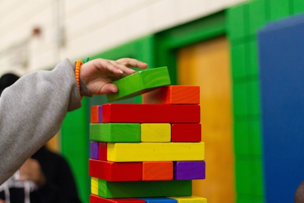 Kid playing Jenga