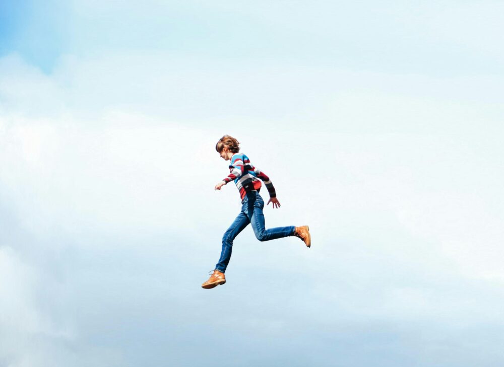 Man flying through sky
