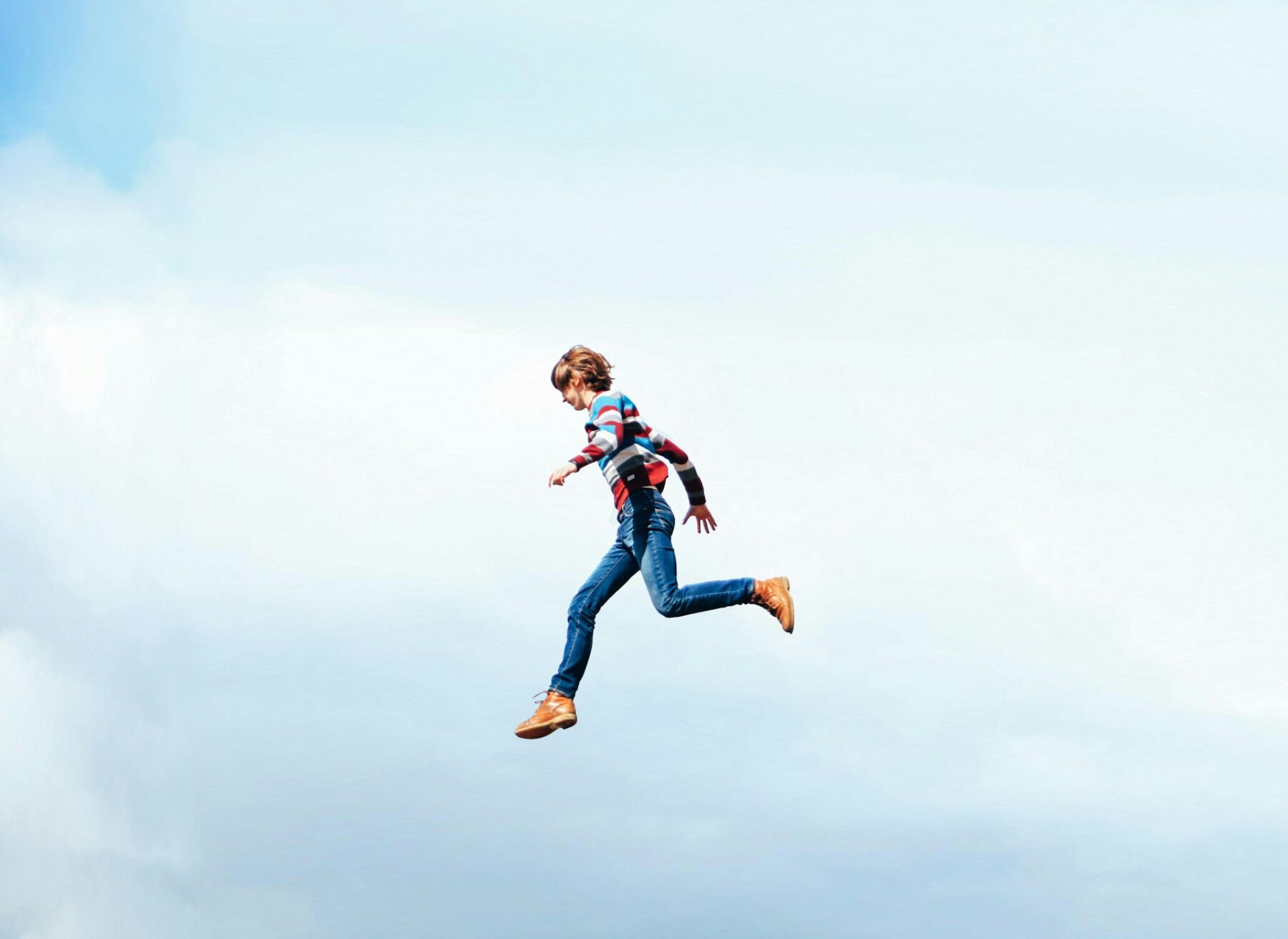 Man flying through sky