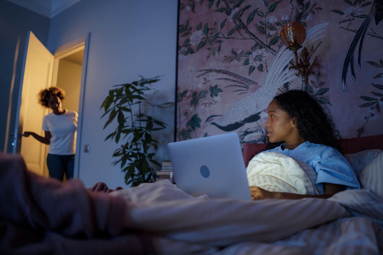 Mother telling teenager its time for bed