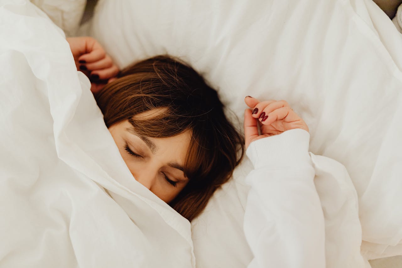 Woman sleeping in bed