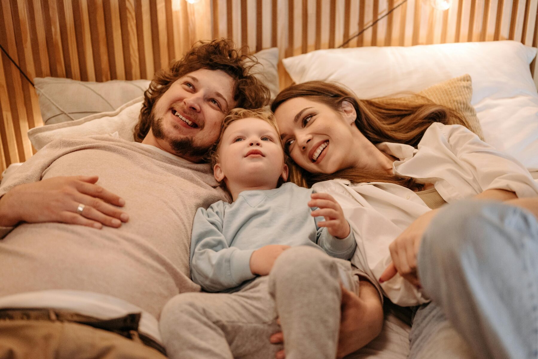 Family spending time in bed