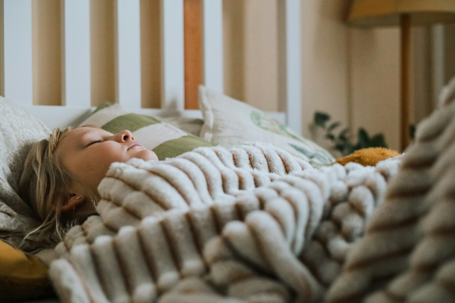 Child sleeping in bed