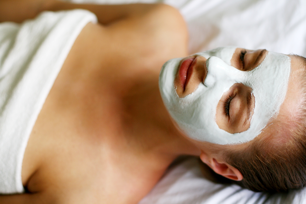 Image of woman having mask skin treatments