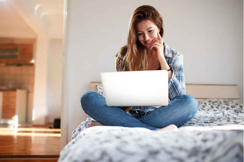 Woman on laptop browsing internet